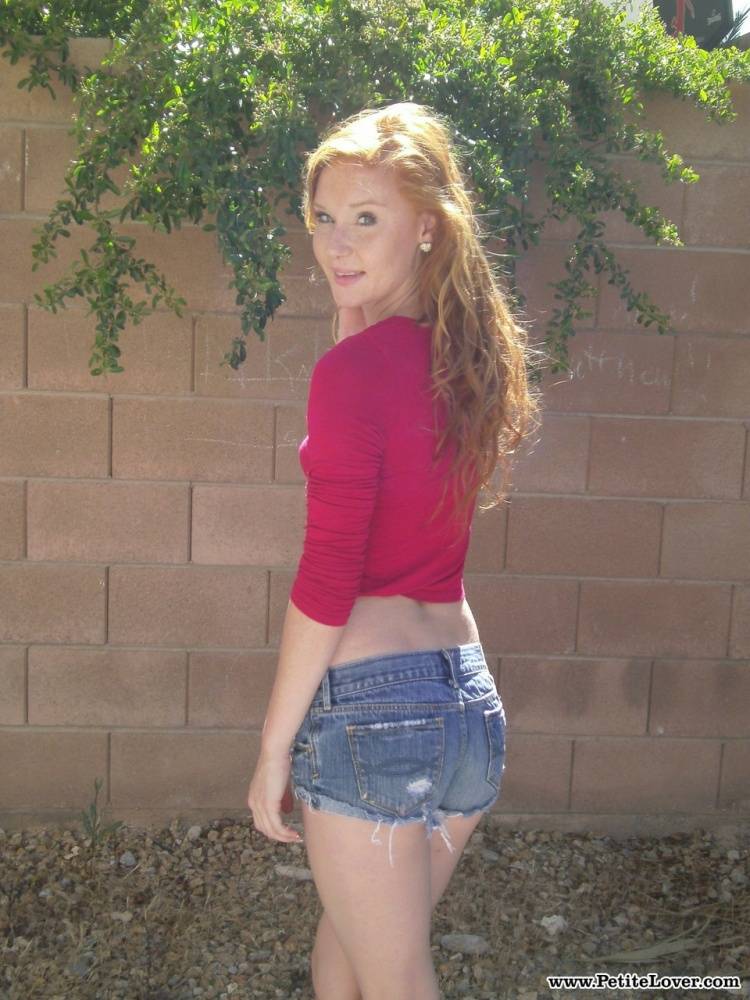 Redhead teen girl Alex Tanner flashes her tiny tits and ass against a wall - #12