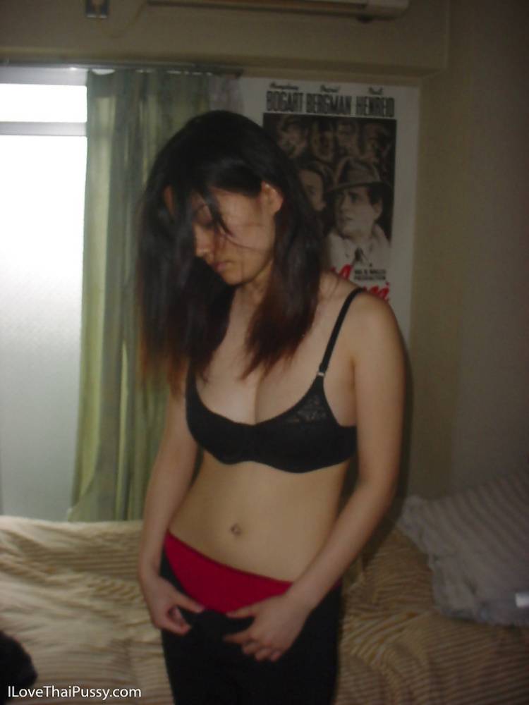 Seductive asian babe slipping off her clothes and showing off her big tits - #14