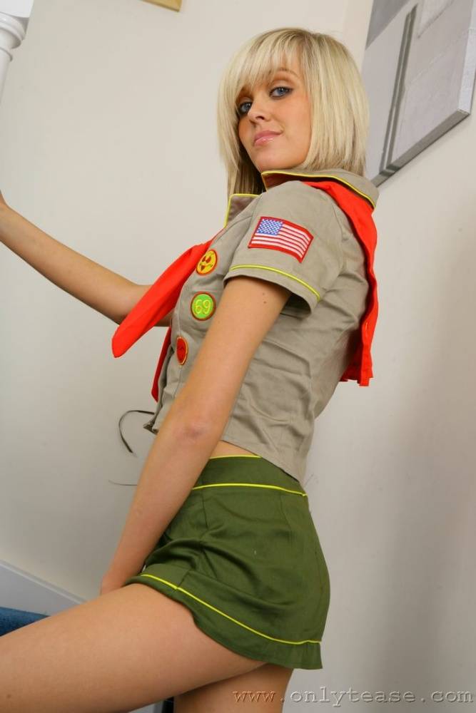 Cute blonde Jade B strips off her uniform to pose topless in panties and socks - #14