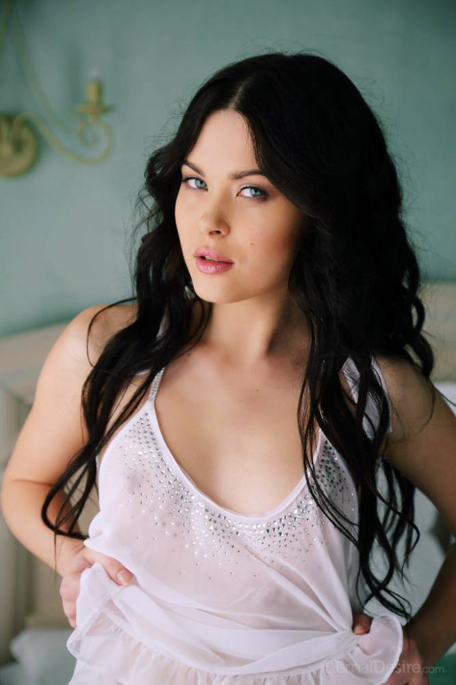 Dark haired teen beauty Amelie B doffs white lingerie to get naked on her bed - #13