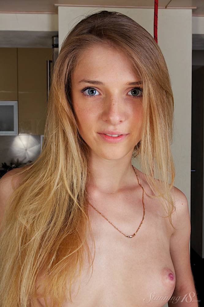 Young solo girl Kat B looks so innocent while stripping naked - #9