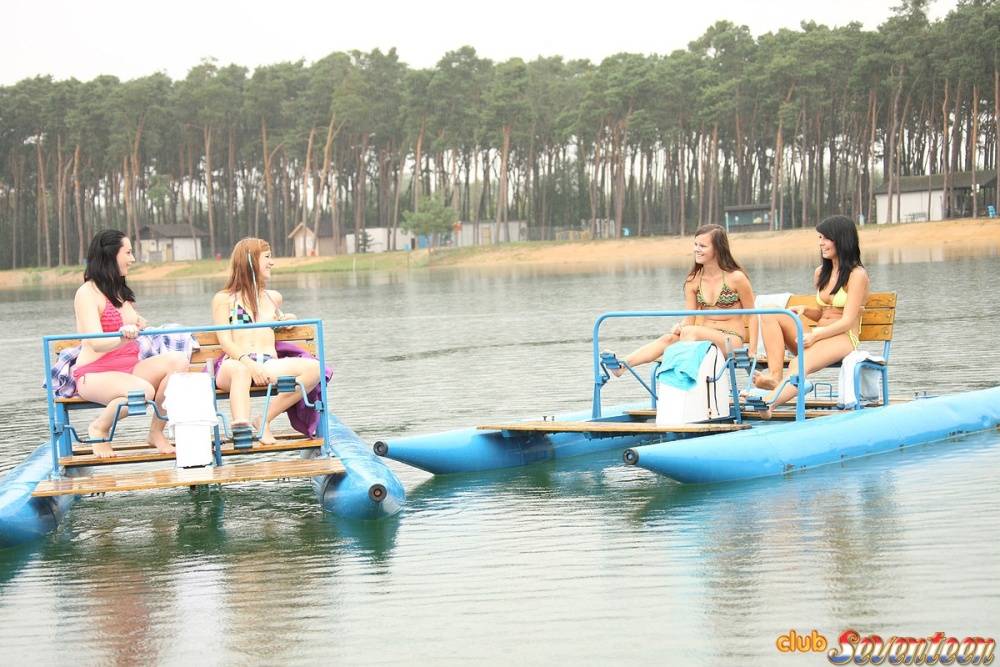 A group of young girls have lesbian sex on a pontoon paddle boat - #5