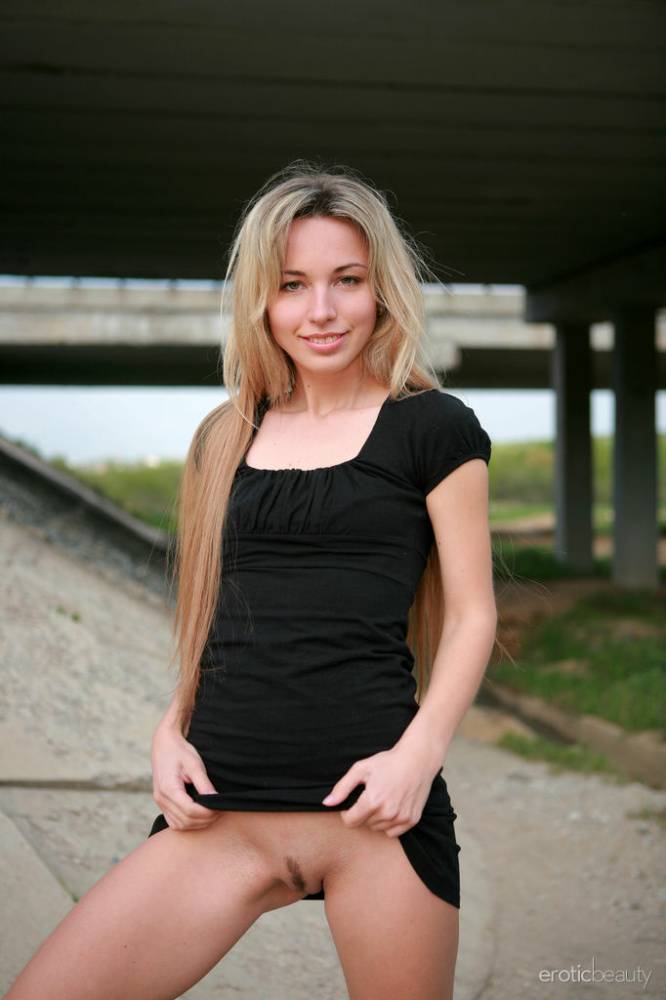Hot teen with long blonde hair Natalia B poses naked near an overpass - #13