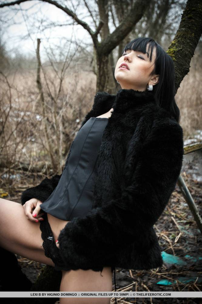 Dark haired teen Lexi B fingers her pussy by abandoned buildings in the woods - #13