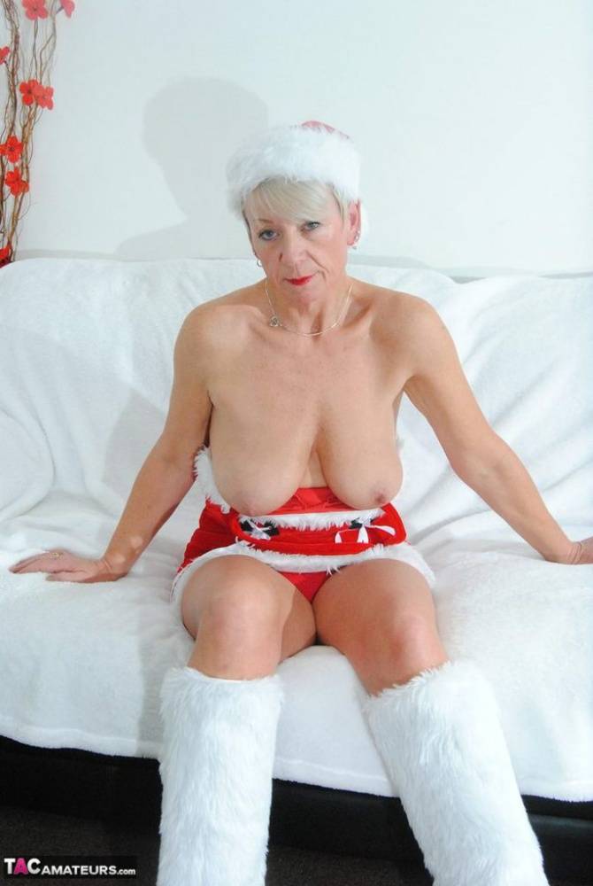 Brazen horny granny Shazzy B hangs her big saggy boobs out by the Xmas tree - #13