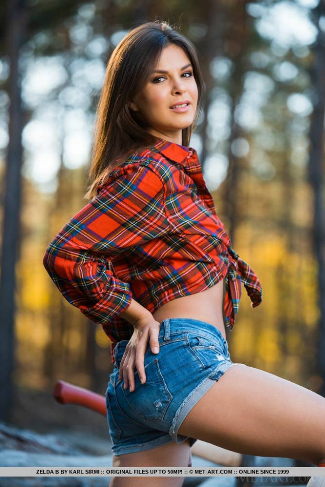 Hot teen Zelda B lays down her axe to get totally naked by cut logs - #10