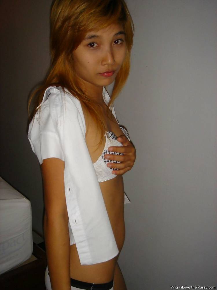 Sweet asian babe lowering her panties and flashing her hairy cooter - #10