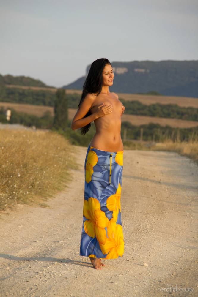 Gorgeous model Macy B drops her sarong to pose on the road with tiny tits bare - #13