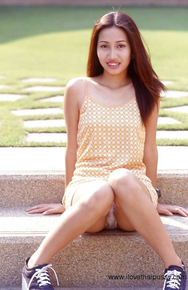 Asian cutie uncovering her sexy body and spreading her slender legs - #10