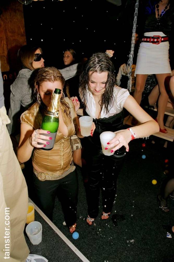 Drunk chicks douse themselves in champagne before sucking cock in nightclub - #1