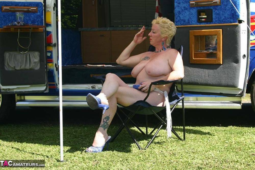 Mature blonde Mary Bitch shows her big tits and pussy outside a B class camper - #2