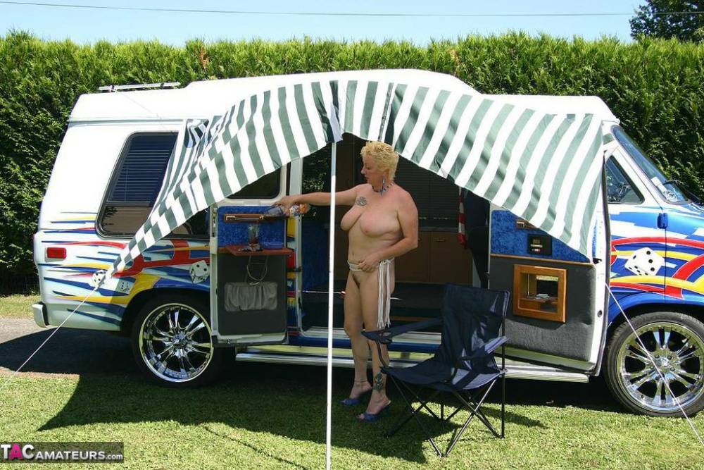 Mature blonde Mary Bitch shows her big tits and pussy outside a B class camper - #5