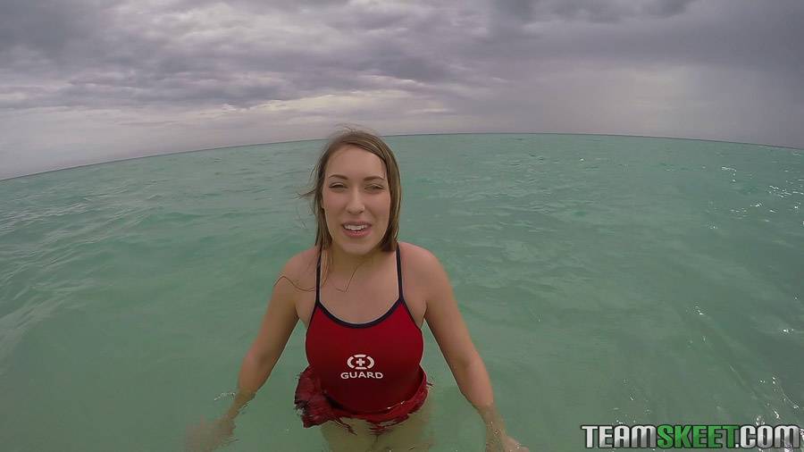 Teen babe Kimber Lee flashing large natural tits in the ocean - #13