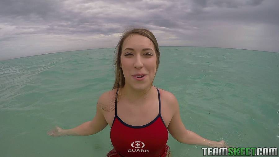 Teen babe Kimber Lee flashing large natural tits in the ocean - #12