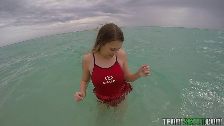 Teen babe Kimber Lee flashing large natural tits in the ocean - #15