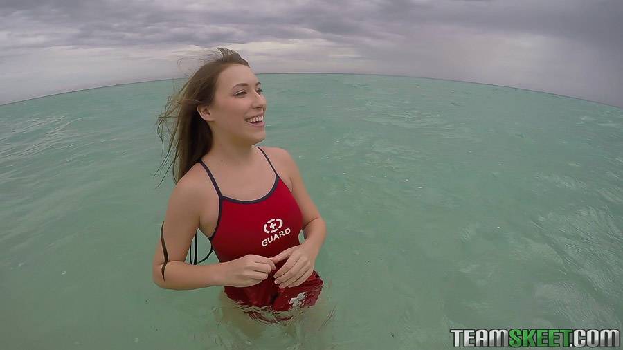 Teen babe Kimber Lee flashing large natural tits in the ocean - #3