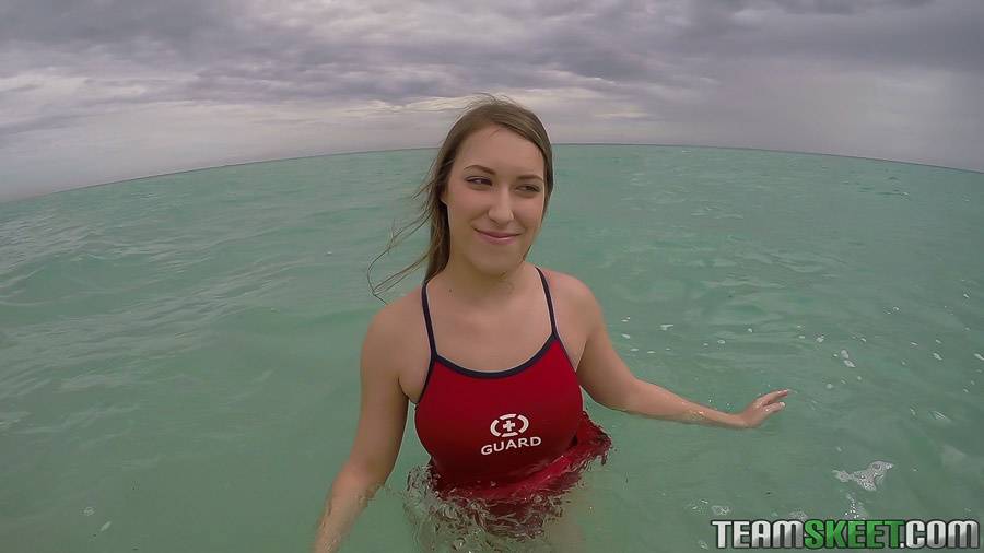 Teen babe Kimber Lee flashing large natural tits in the ocean - #11