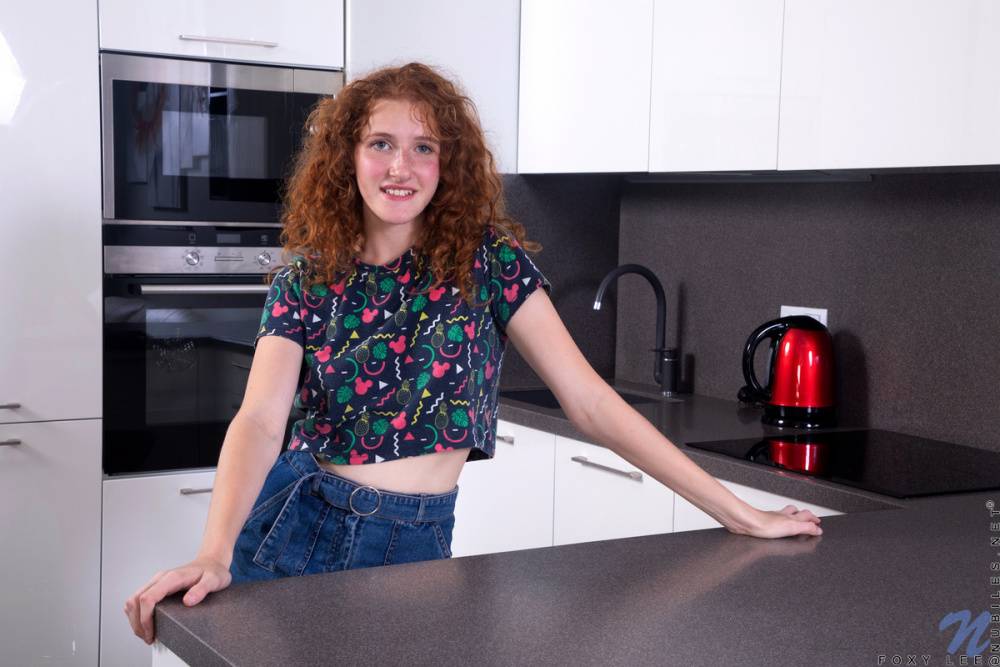 Teen solo girl Foxy Lee sports curly red hair while getting naked in a kitchen - #15