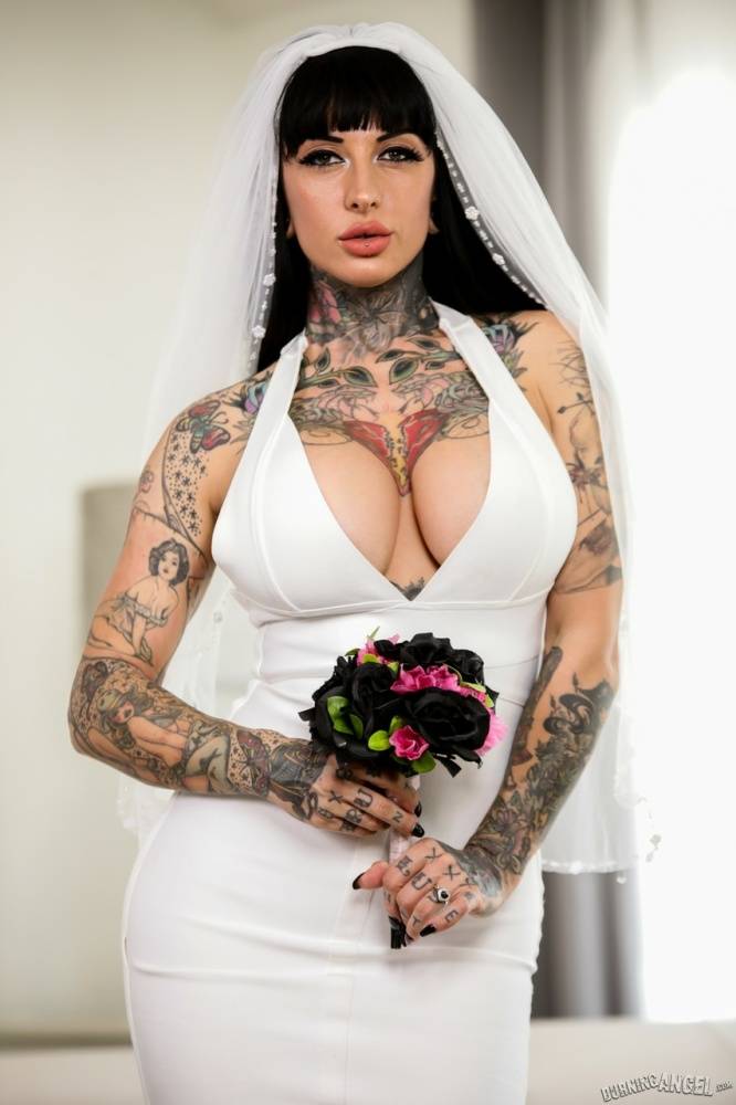 Tattooed bride Jessie Lee deepthroats her black groom prior to anal sex - #14