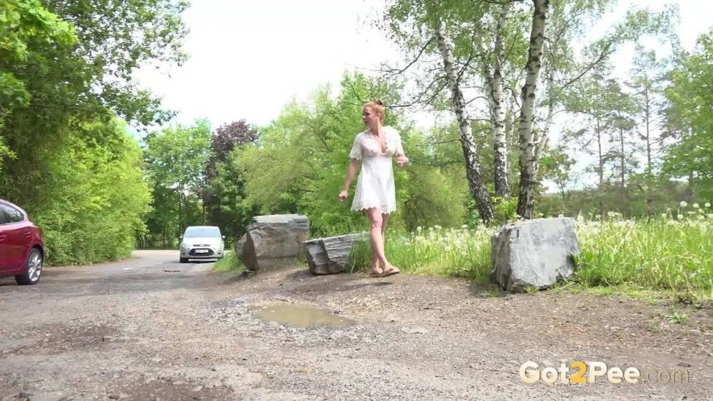 White girl Chrissy Fox sports no undies while taking a piss at a park entrance - #12