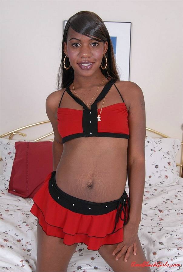 Ebony solo girl uncups her tits in a microskirt and thong combo - #14