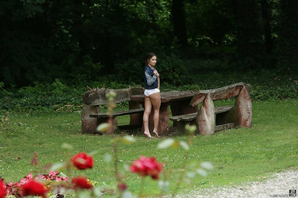 Sexy solo girl Anita Bellini showing off perky tits in white panties in woods - #12