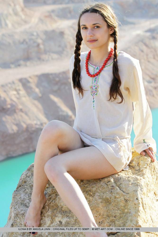 Teen model Ilona B poses nude in pigtails high above ocean waters - #7