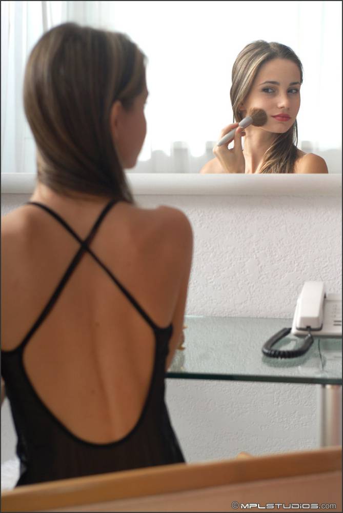 Beautiful solo girl admires her perfect ass in a mirror on the wall - #9