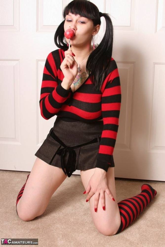 Cute brunette Susy Rocks socks on candy while in a micro skirt and pigtails - #5