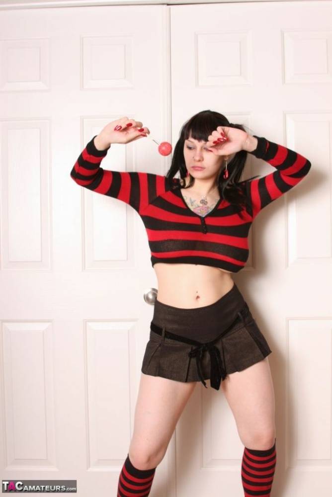 Cute brunette Susy Rocks socks on candy while in a micro skirt and pigtails - #10