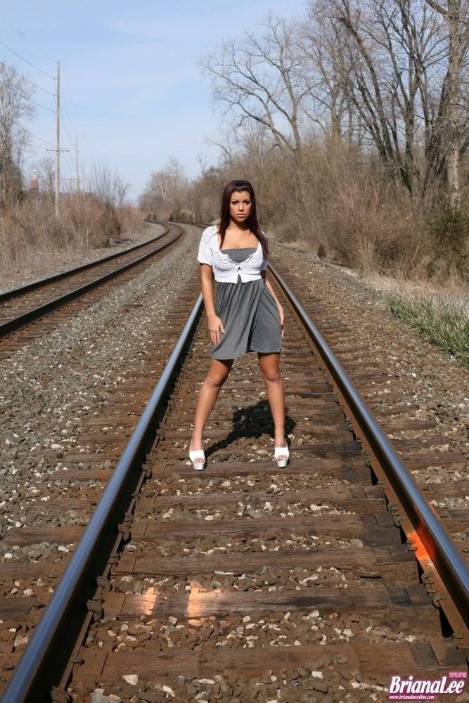 Amateur chick Briana Lee flashes her bare upskirt ass on train tracks - #12