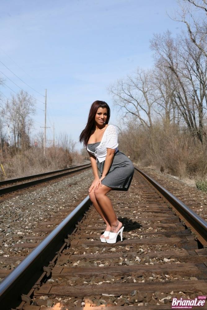 Amateur chick Briana Lee flashes her bare upskirt ass on train tracks - #13
