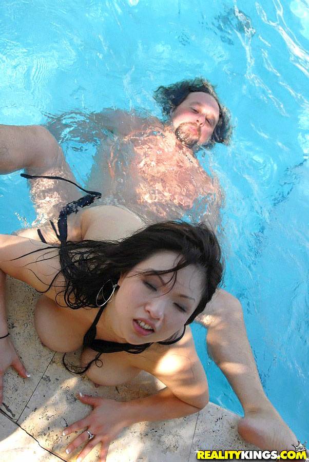 Asian MILF Alexia sucks a fat tourist's morning glory beside the pool - #13