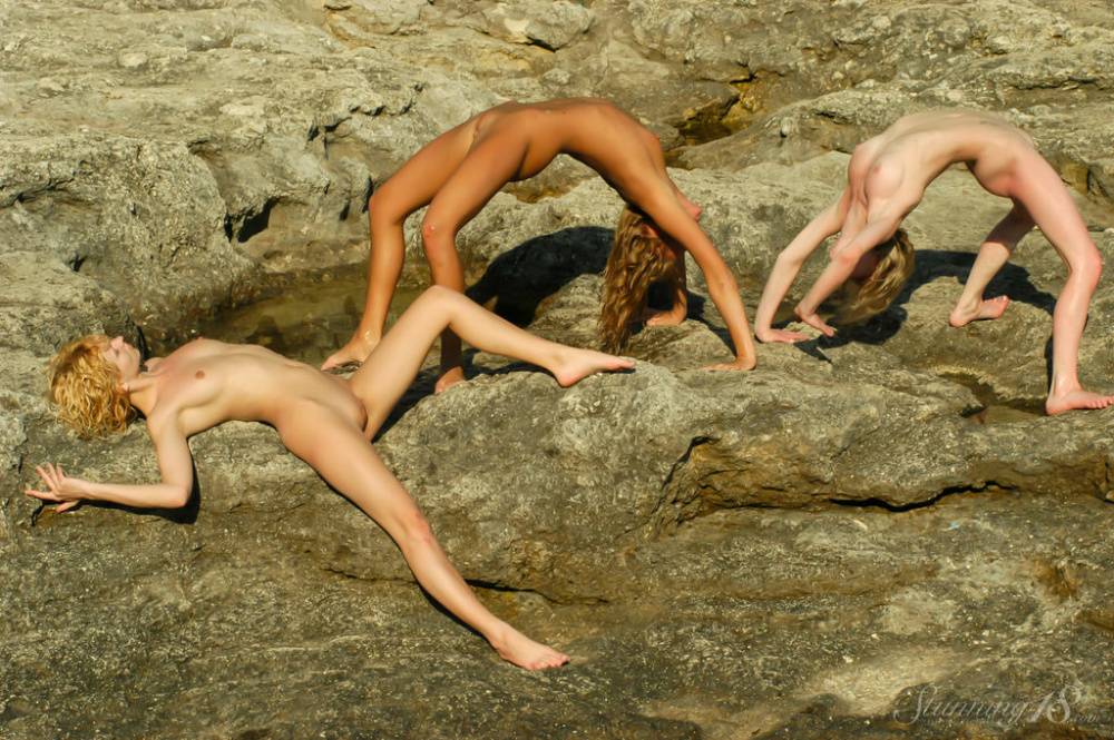 Teen lesbians Kozma O, Dorinda N and Agape B frolic naked in a tidal pool - #6