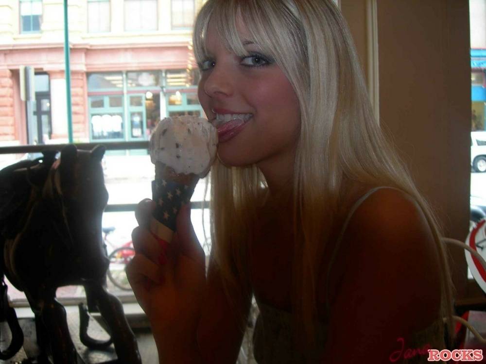 Blonde teen Jana Jordan licks an ice cream cone before straddling a toy horse - #4
