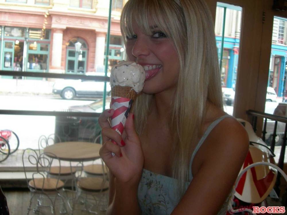 Blonde teen Jana Jordan licks an ice cream cone before straddling a toy horse - #9
