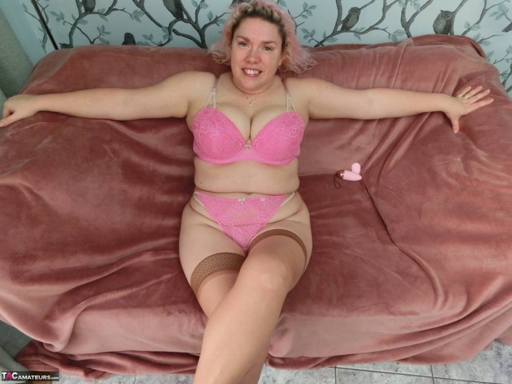 Older amateur Barby masturbates with a sex toy while on a loveseat - #15