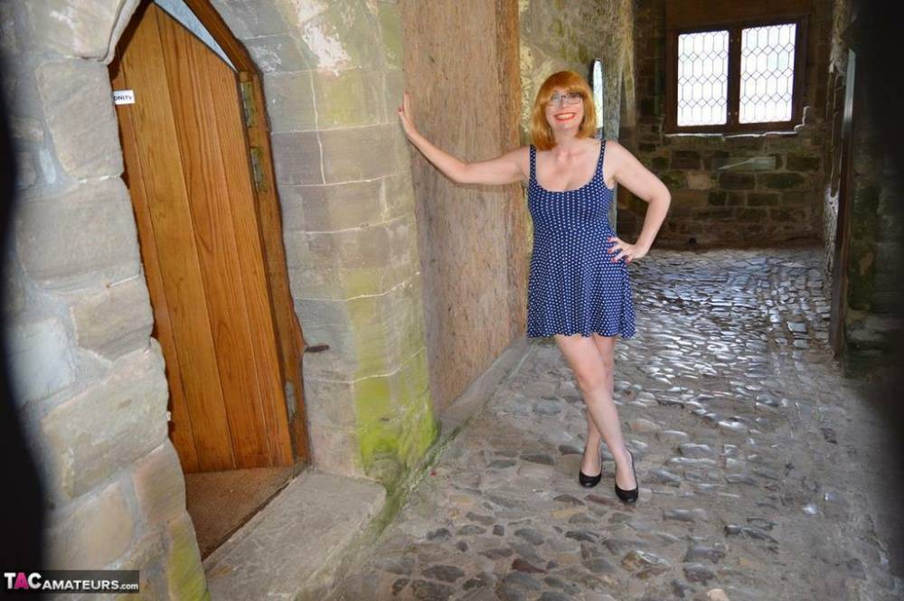 Redheaded amateur Barby Slut gets totally naked while wandering castle grounds - #8