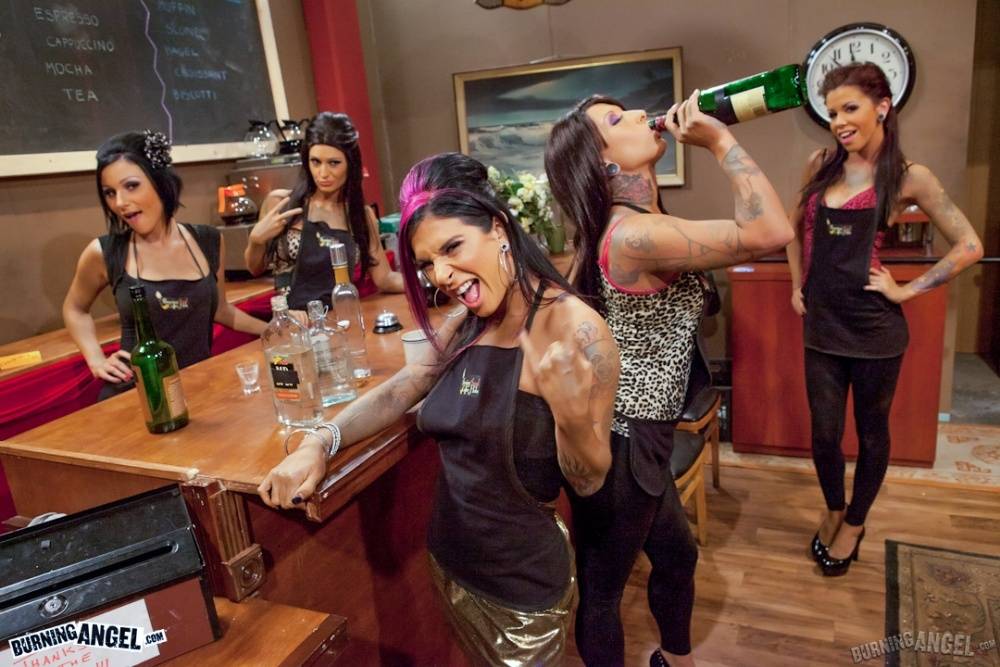 Fully clothed punk girls with lots of tattoos get drunk at a bar - #4