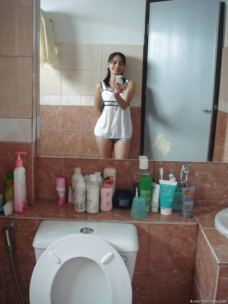 Petite Thai girl tales self shots before stripping naked in bathroom - #9