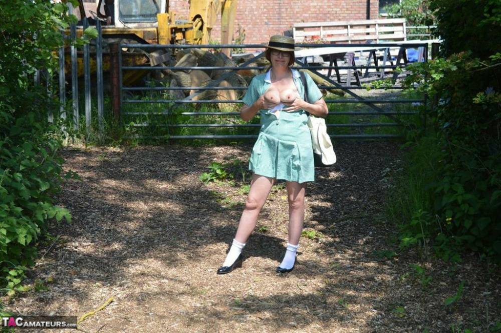 Older amateur Barby Slut strips down to white socks & shoes in a public place - #5
