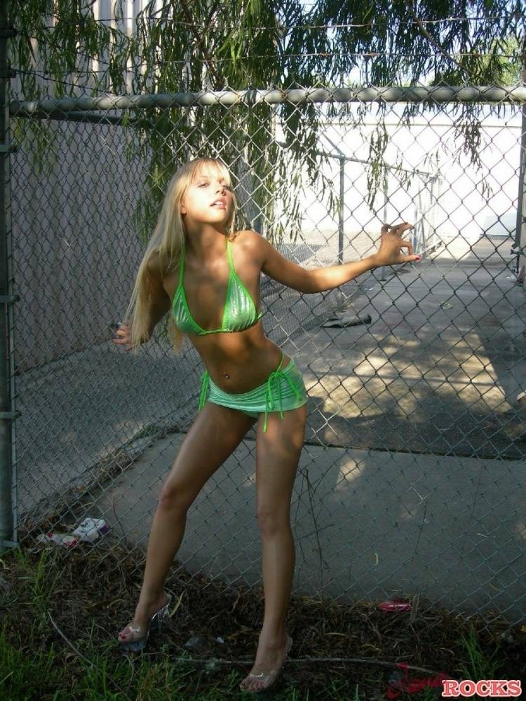 Blonde teen Jana Jordan models by herself in a few bikini combos - #1