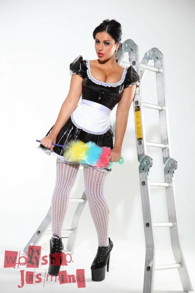 Dark-haired beauty Jasmine Jones models a latex maid uniform in sexy stockings - #3