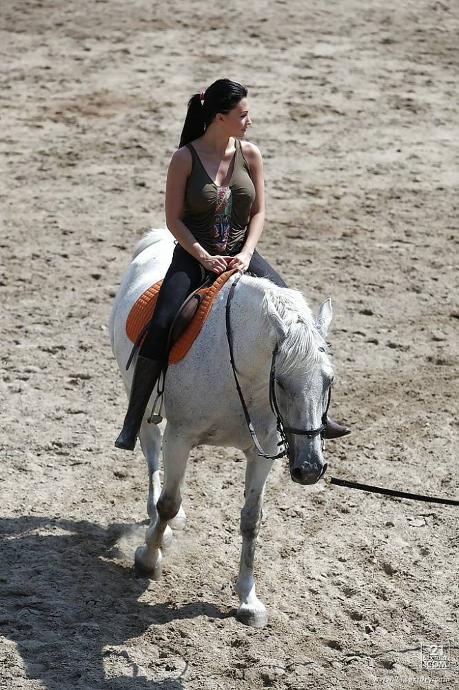 Pornstar Aletta Ocean is riding a horse outdoor in glasses - #7
