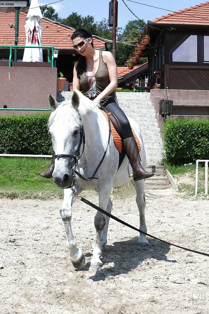 Pornstar Aletta Ocean is riding a horse outdoor in glasses - #8