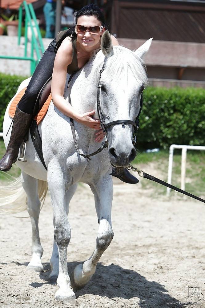 Pornstar Aletta Ocean is riding a horse outdoor in glasses - #14