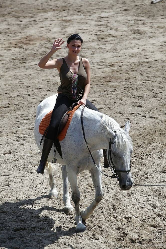 Pornstar Aletta Ocean is riding a horse outdoor in glasses - #10