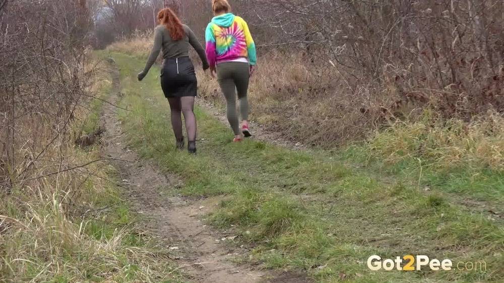 Redheads Chrissy Fox & Red Fox squat for a pee while taking a hike - #1