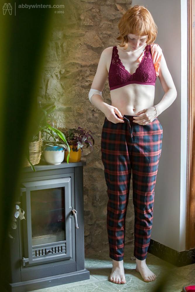 Skinny redheaded chick Emma B recorded getting dressed by hidden camera - #15