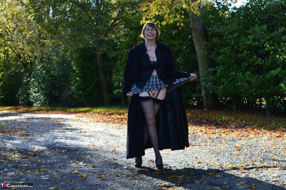 Middle-age amateur Barby Slut exposes herself in a long coat in public places - #11